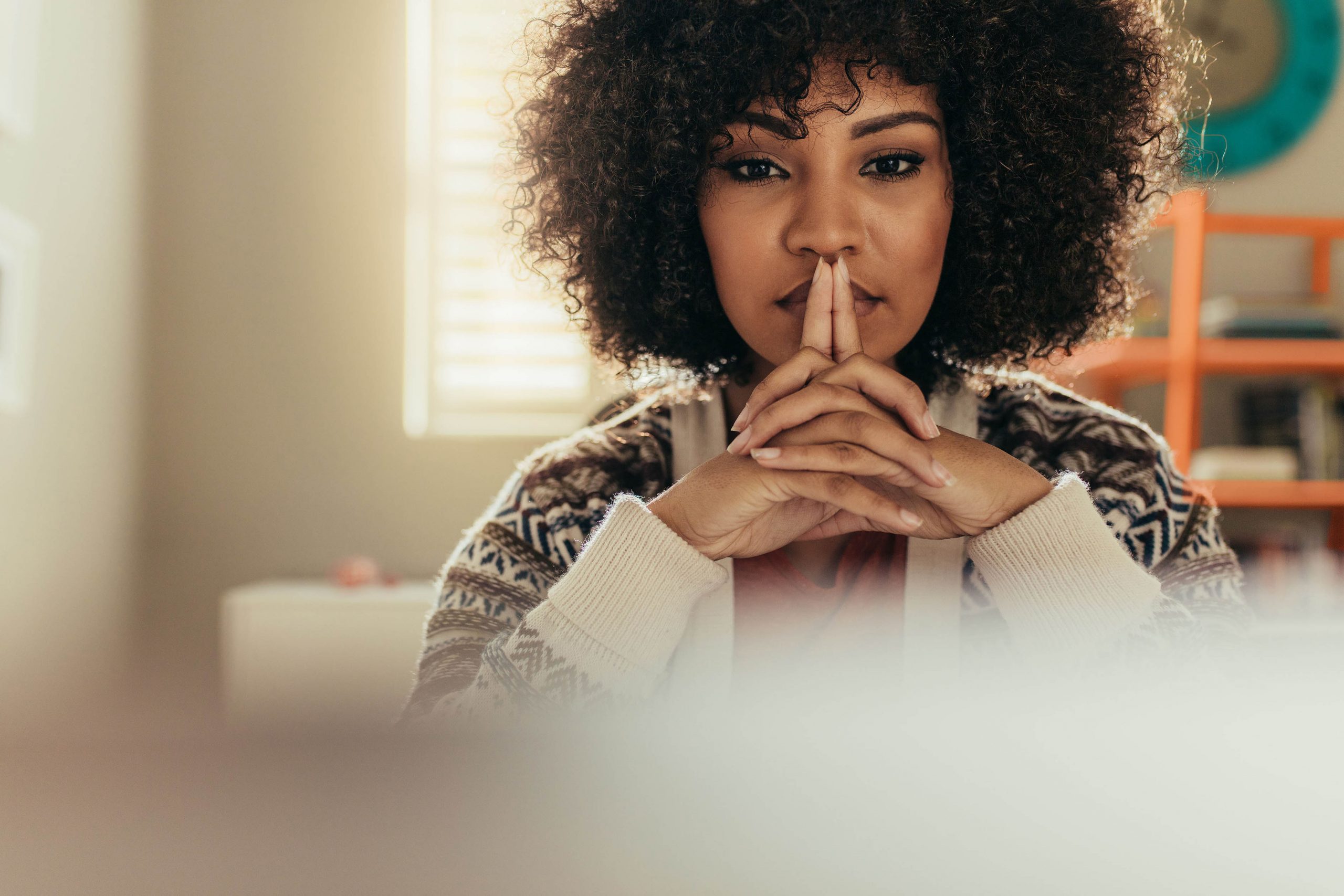 A female human leader contemplating development