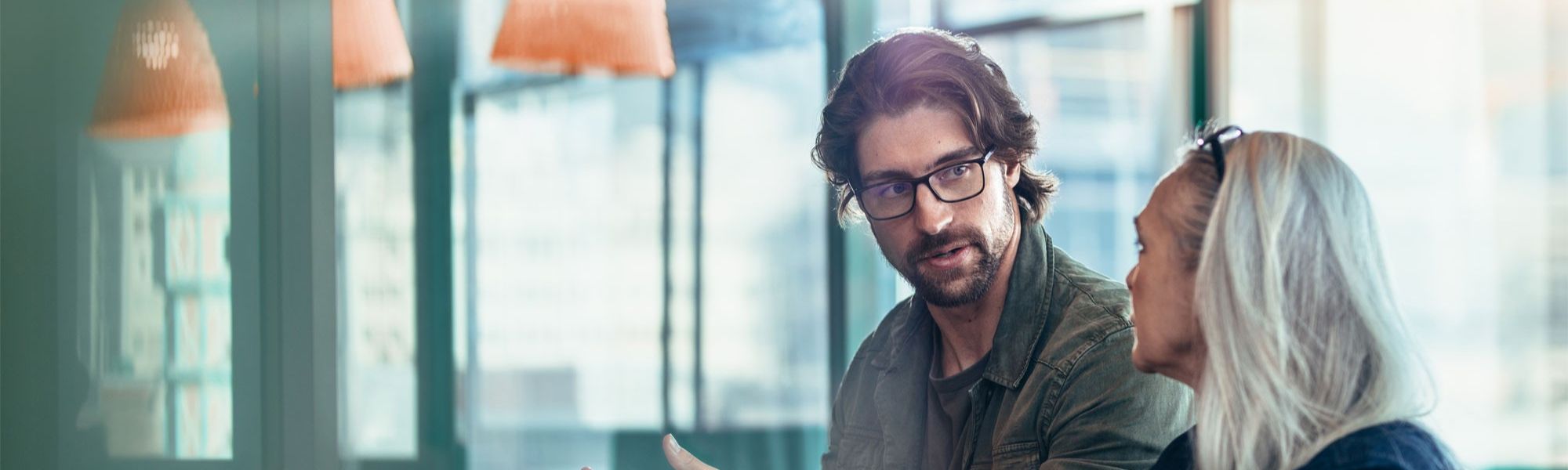 Colleagues at work discussing change